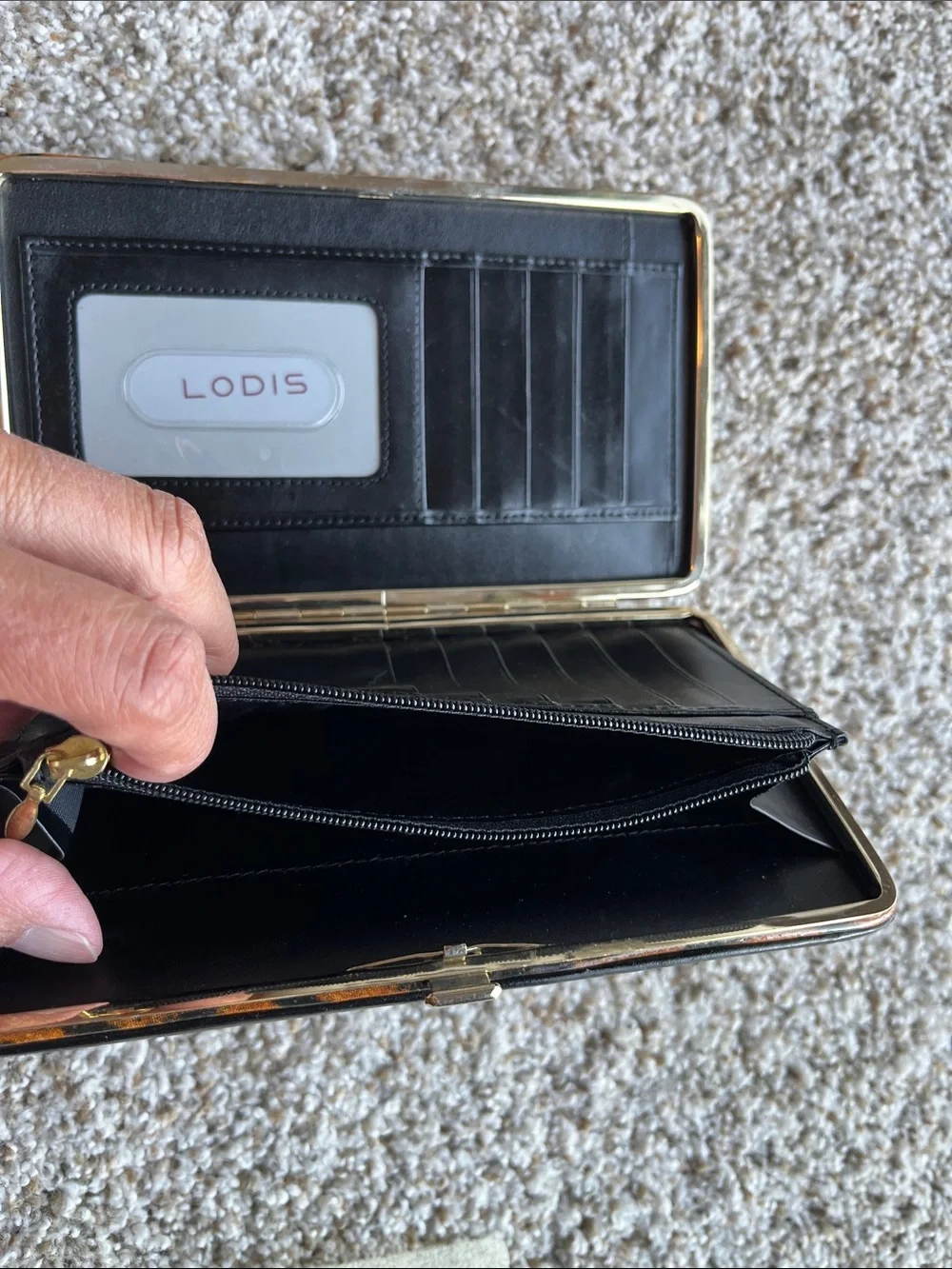 Lodis Black Leather snap wallet.